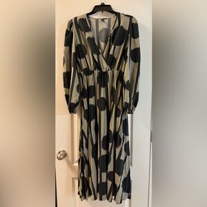 Elegant Black and Cream Polka Dot Dress